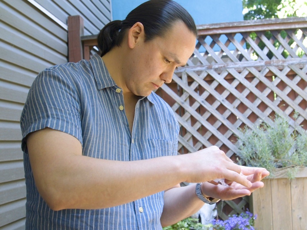 Trudeau Scholar Kody Doxtater shows some tobacco seeds