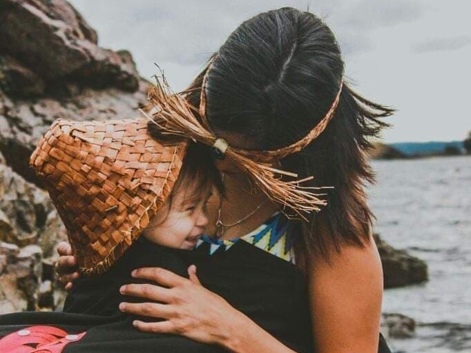 Indigenous mother with child