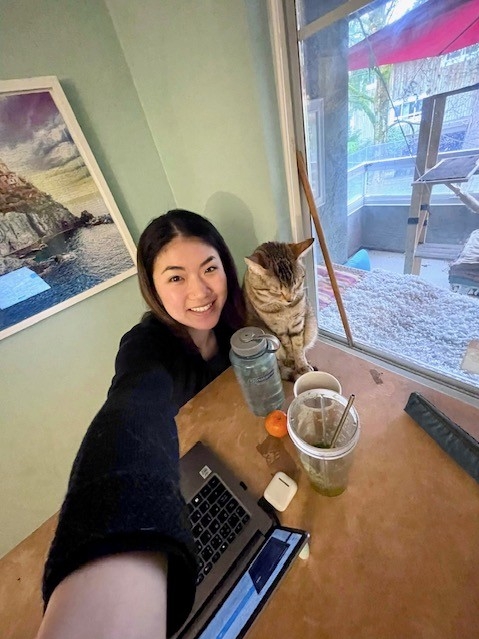 Kelly with her at-home work companion.